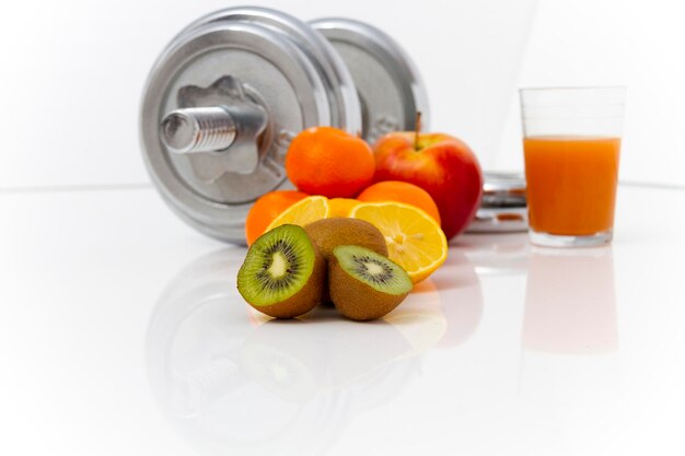 Photo close-up of orange fruits on table