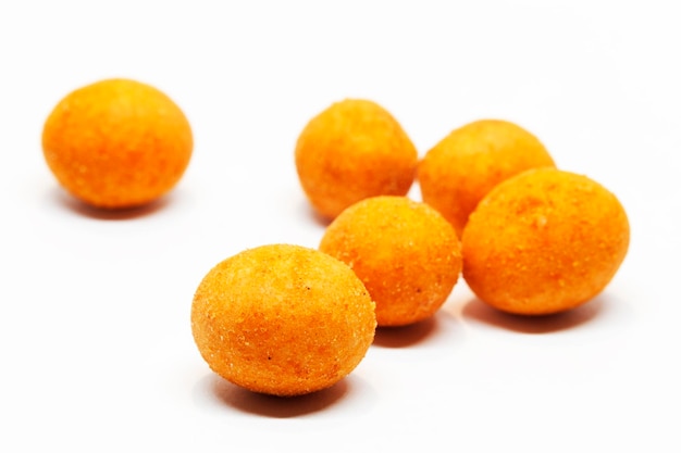 Photo close-up of orange fruits on white background