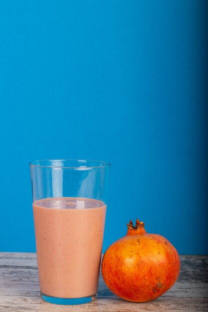 Close-up of orange juice on table