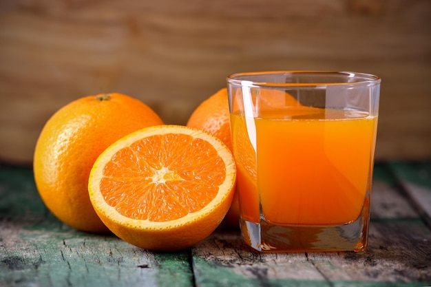 Close-up of orange juice on table