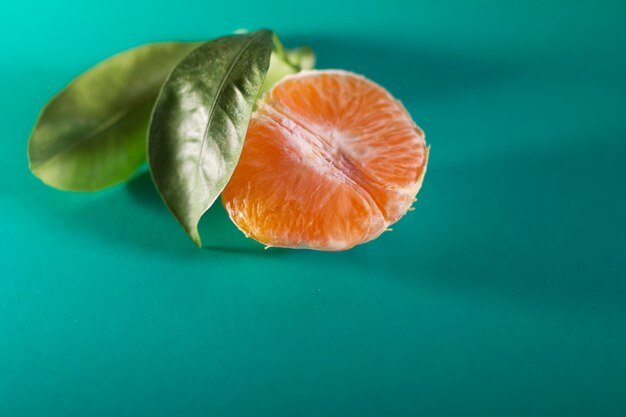 Close-up of orange slice on table