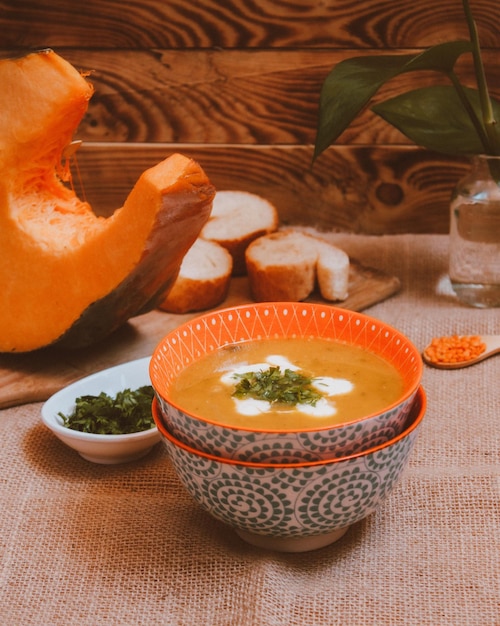 Close-up of orange slices in bowl on table