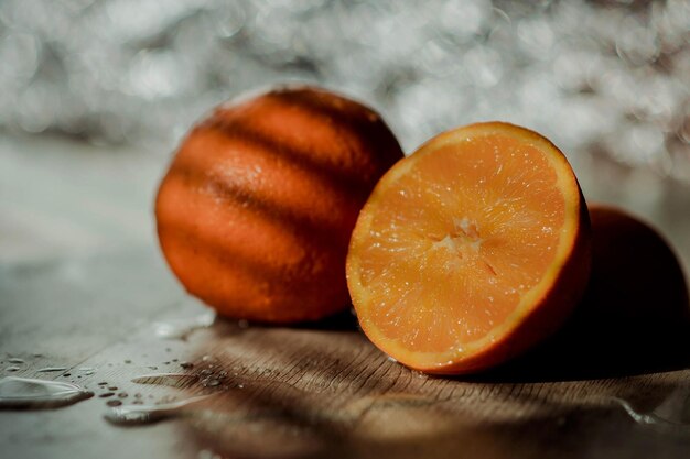 Close-up of orange slices on table