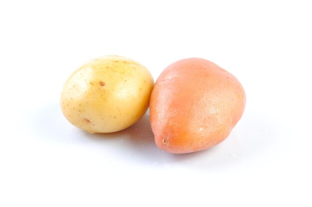 Close-up of orange slices over white background