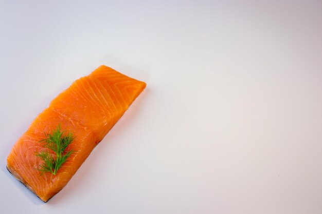 Close-up of orange slices over white background