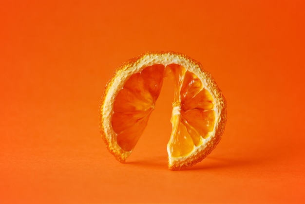 Close-up of orange over white background