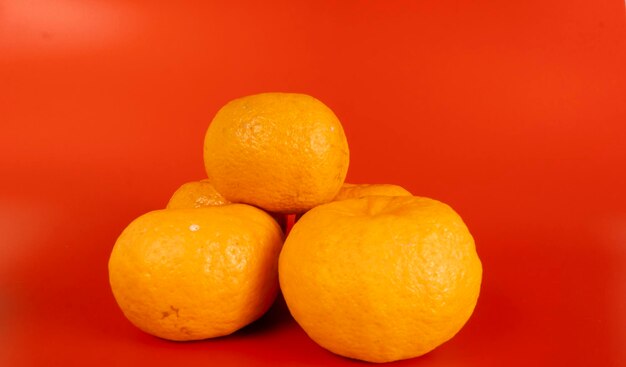 Close-up of oranges against orange background