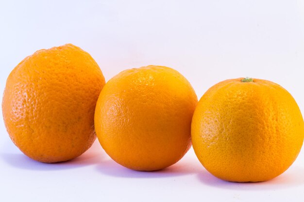 Close-up of oranges against orange background