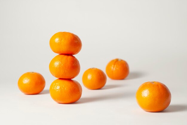 Close-up of oranges against white background