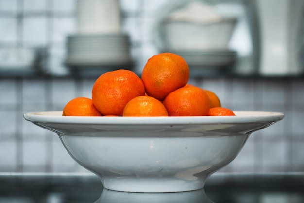 close-up of oranges in bowl
