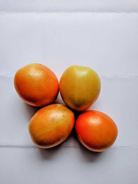 Close-up of oranges on table