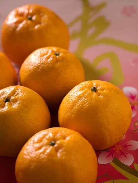 Close-up of oranges on table