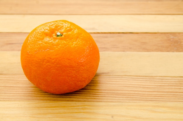 Close up oranges on the wooden table background