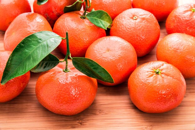 Close-up of oranges on wooden table