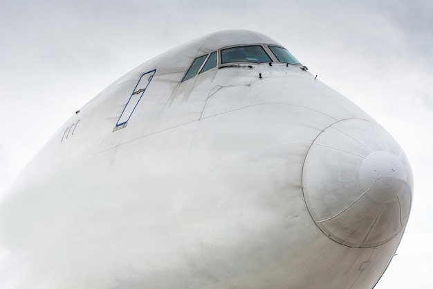 Close-up outside cabin a large white cargo aircraft