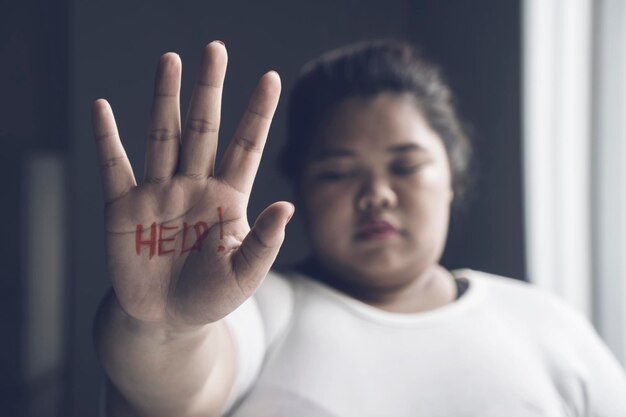 Photo close-up of overweight woman hand with text