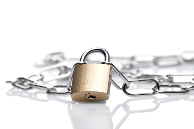 Photo close-up of padlock against white background