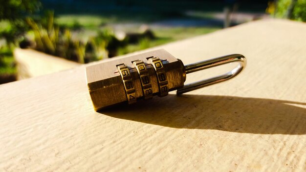 Close-up of padlock on table