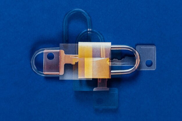 Close-up of padlocks against blue background