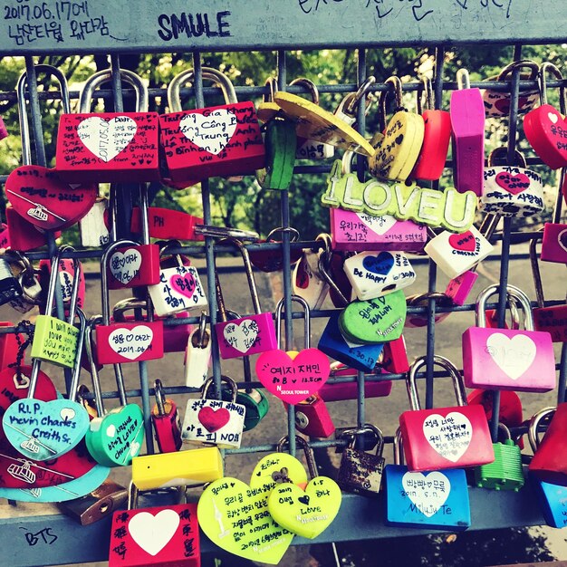 Photo close-up of padlocks hanging for sale