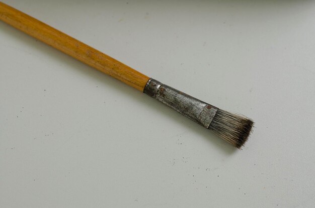 Close-up of paintbrush on table