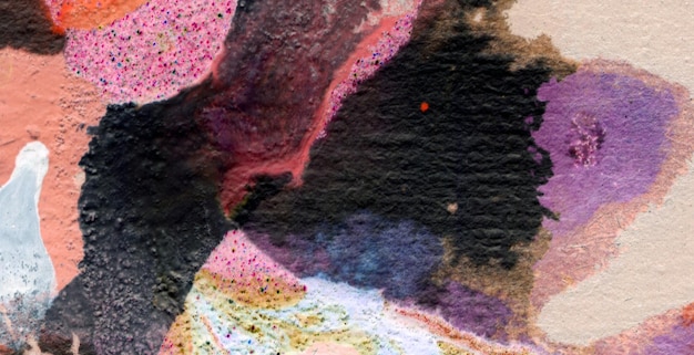 A close up of a painting with pink and purple colors.