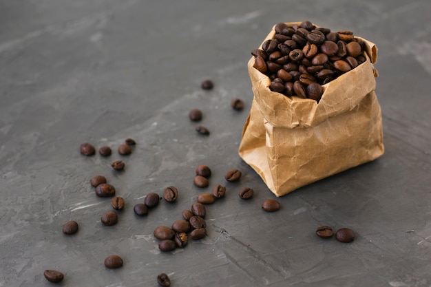 Close-up paper bag filled with coffee beans