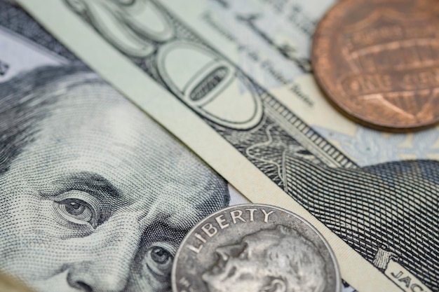 Photo close-up of paper currencies and coin