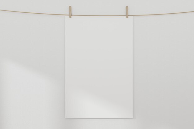 Photo close-up of paper hanging on white wall