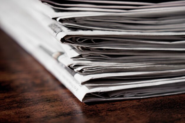 Close-up of paper stack on table