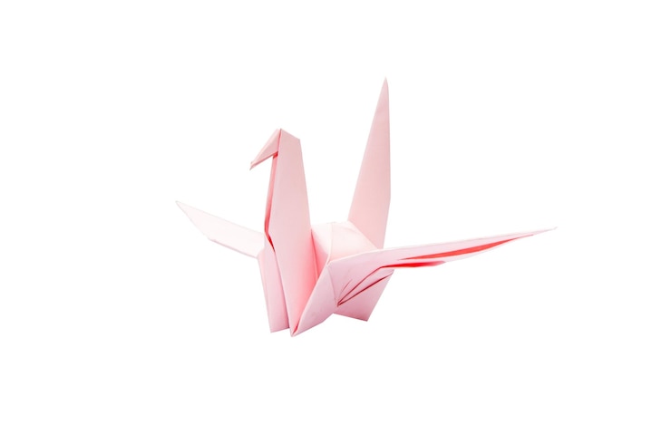 Photo close-up of paper toy against white background