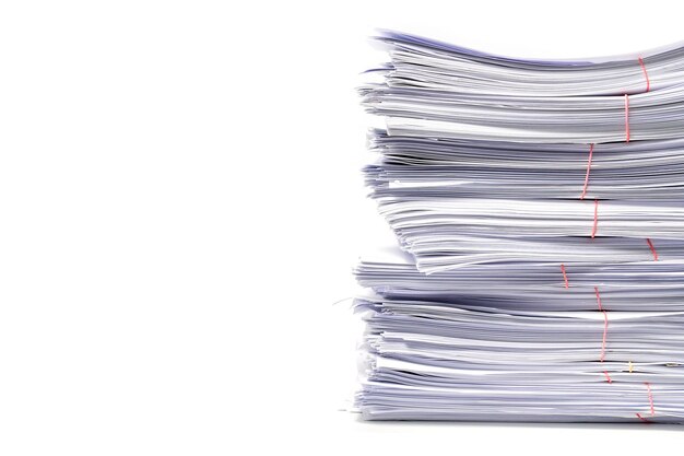 close-up of papers stack against white background