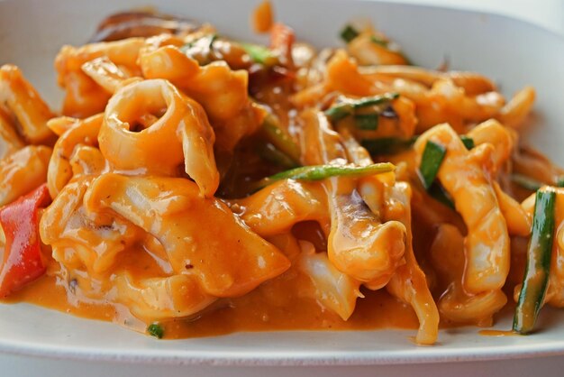 Close-up of pasta served in plate on table