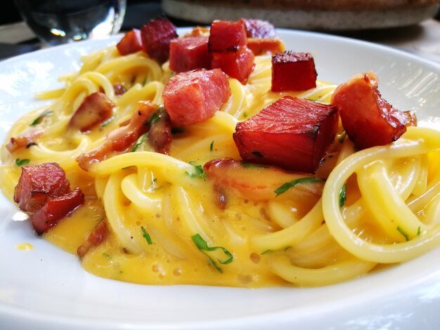 Close-up of pasta served in plate