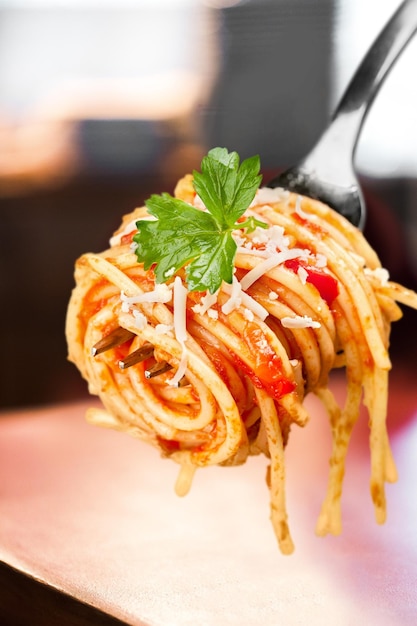 Close-up of pasta spaghetti with tomato sauce