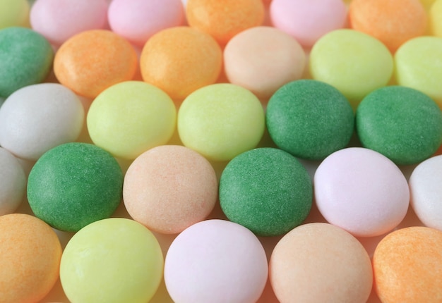 Close-up of Pastel Colored Round Candies for Background, Texture