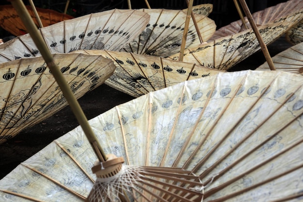 Photo close-up of patterned umbrellas at market