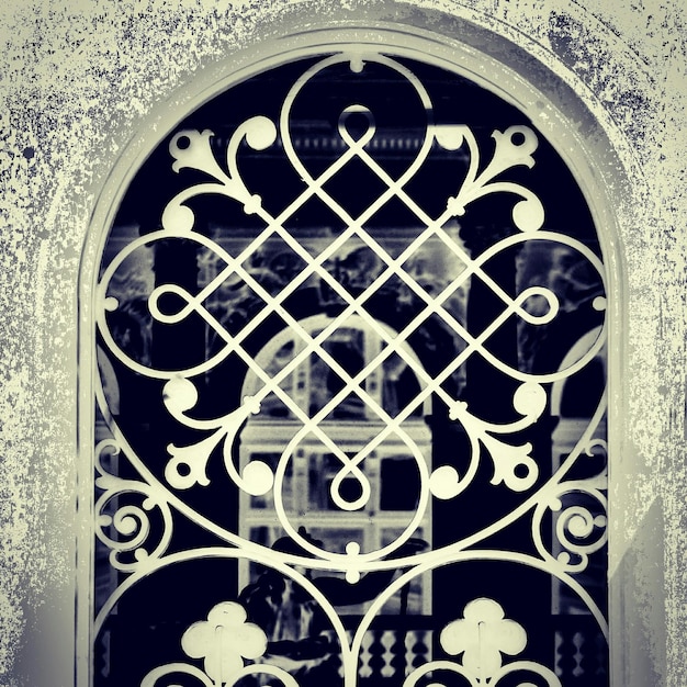 Photo close-up of patterned window of building