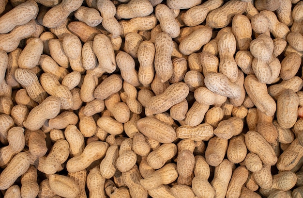 A close up of peanuts in a pile