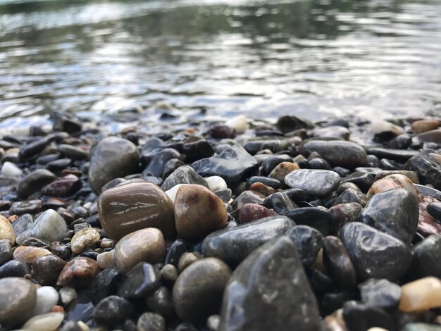 Photo close-up of pebbles at beach