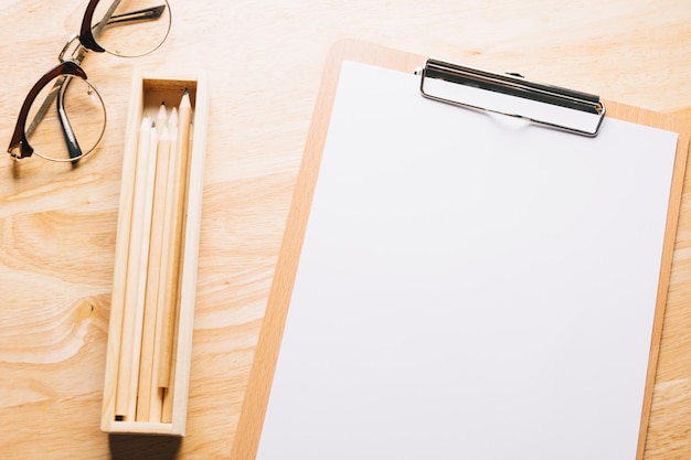 close-up of pen on table against white background
