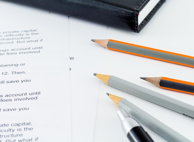 Close-up of pencils on paper