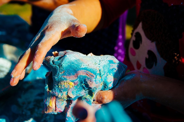 Photo close-up of person cooking pastry