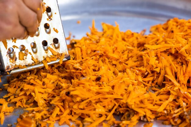 Close-up of person holding yellow food