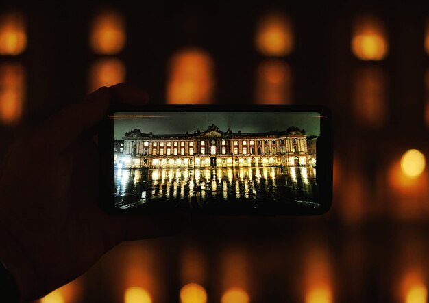 Photo close-up of person photographing with smart phone