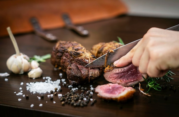 Close-up of person preparing food on cutting board