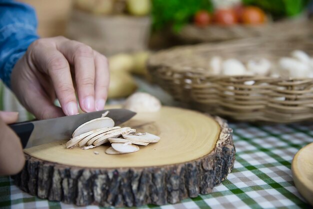 Close-up of person preparing food on table