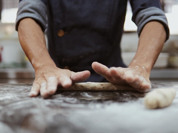 Photo close-up of person preparing food