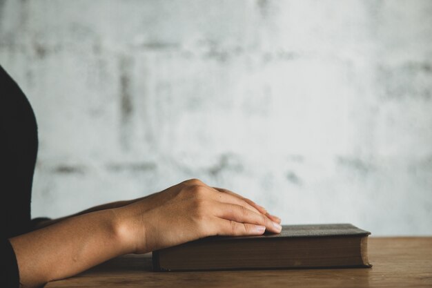 Close up on person reading the bible