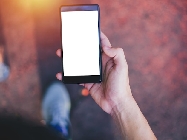 Photo close-up of person using mobile phone